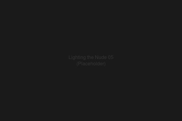Lighting the Nude V — broad wrap lighting on reclining figure, luminous skin tones in black and white