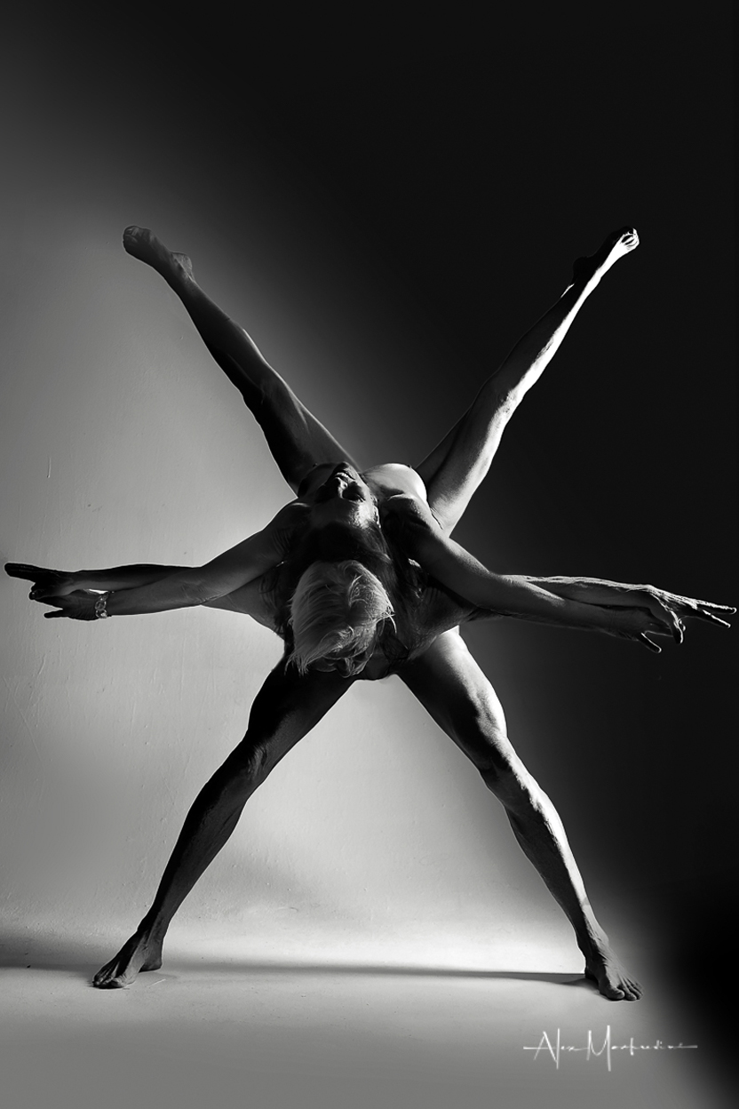 Shadow Play II — dramatic angular shadows creating bold patterns of light and dark, monochrome fine art